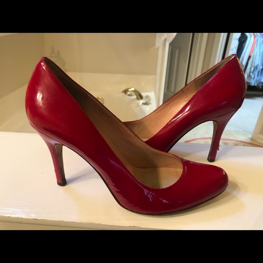 Red patent leather pumps